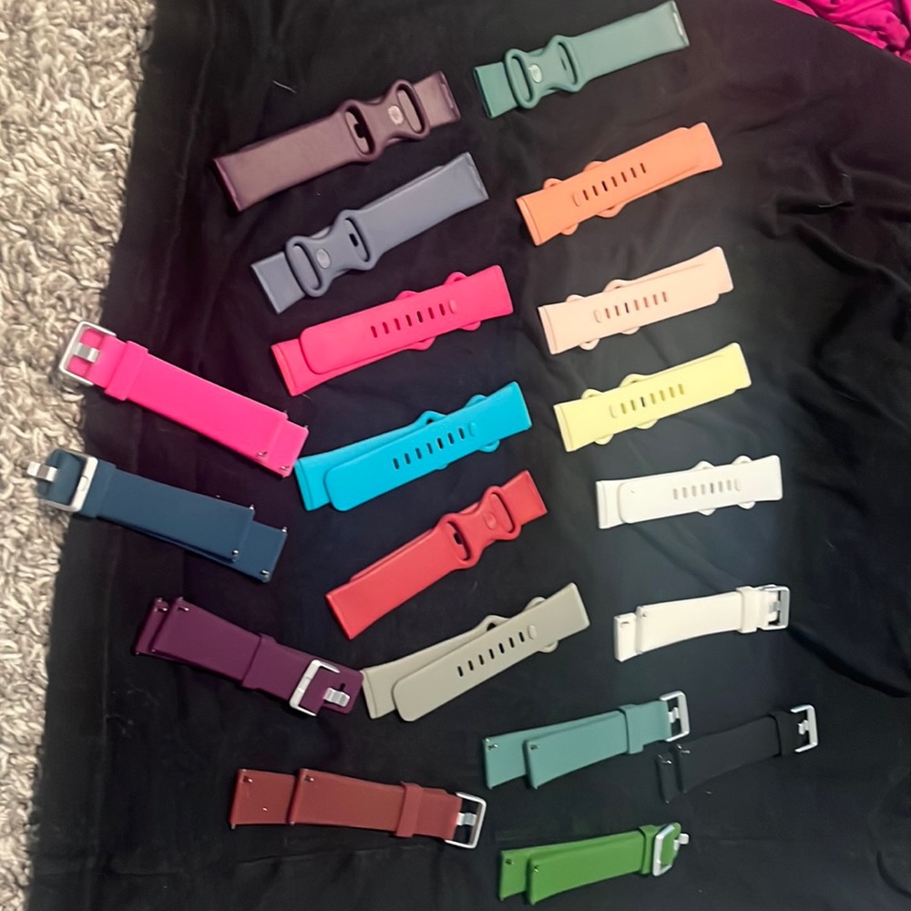 Assorted fit bit bands.